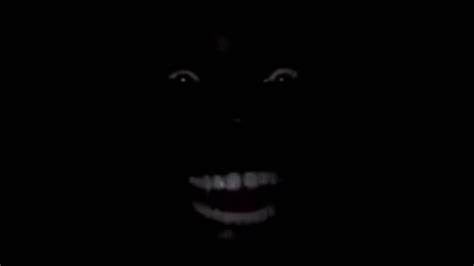 Create meme: Negro in the dark , Negro laughing in the dark, black, dark