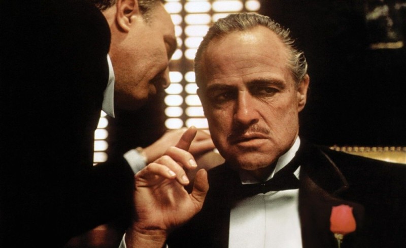 Create meme: don Vito Corleone Marlon Brando, marlon brando don corleone, don Corleone Smoking a cigar