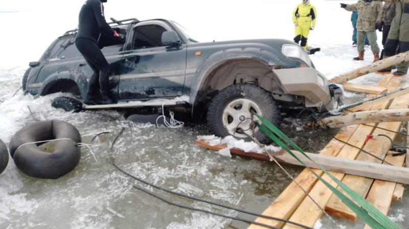 Create meme: they pull the car out from under the ice, a car on ice, a car for driving on ice