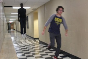 Create meme: flying man at the corridor behind the fleeing man meme, School, guy escapes from soars in the corridor