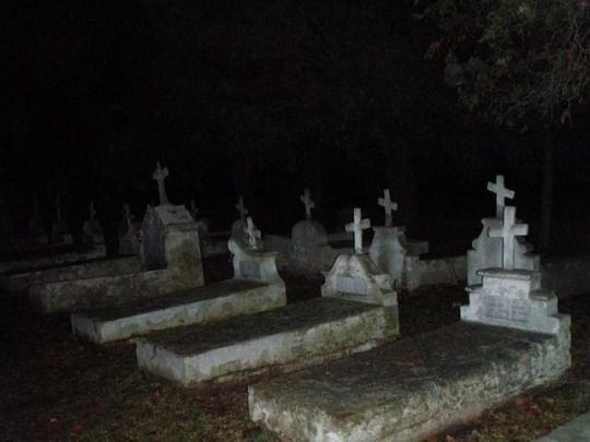 Create meme: cemetery at night, scary graveyard, Goths in the cemetery at night