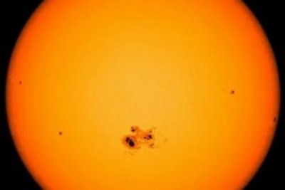 Create meme: sunspots, the sun through a telescope, solar activity