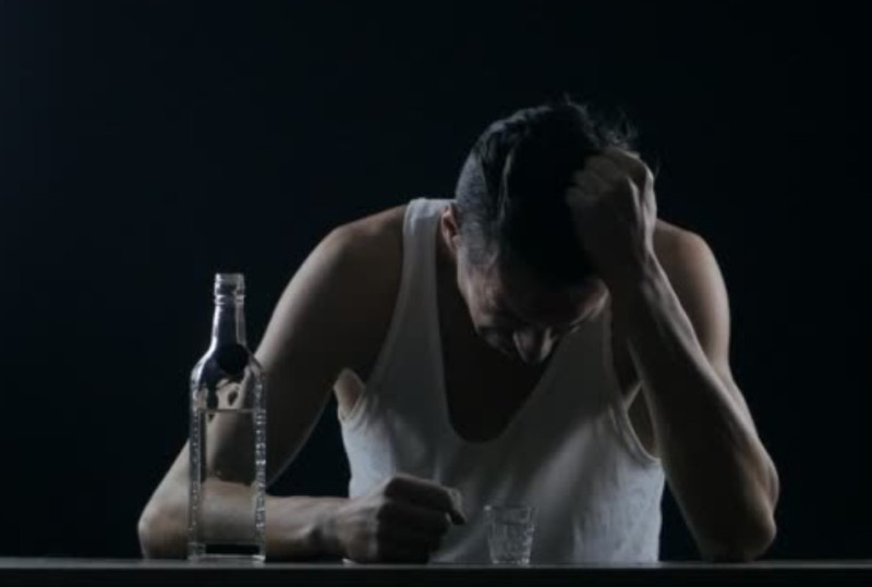Create meme: a man is crying with a bottle, alcohol , male 