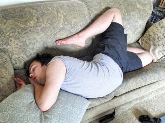 Create meme: sleep, sleeping man on the couch, uncomfortable pose