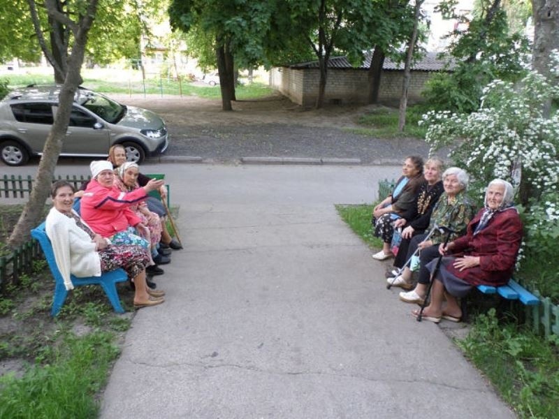 Create meme: grandmother on a bench at the entrance, grandmother on the bench, grandmother on a bench at the entrance