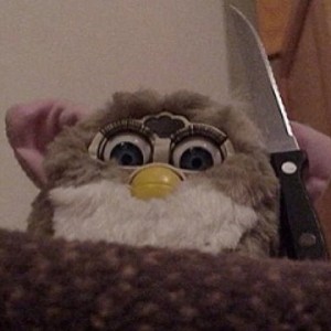 Create meme: furby with knife, meme furby, funny photo Furby