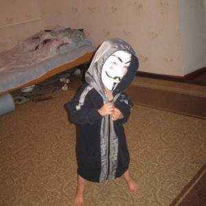 Create meme: Child, schoolboy in mask anonymous