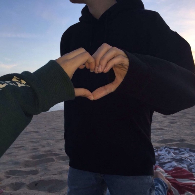 Create meme: a heart with the hands of a guy, photos of friends, The guy shows the heart with his hands