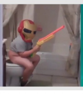 Создать мем: delete this meme, funny, фото мальчика в маске железного человека на туалете
