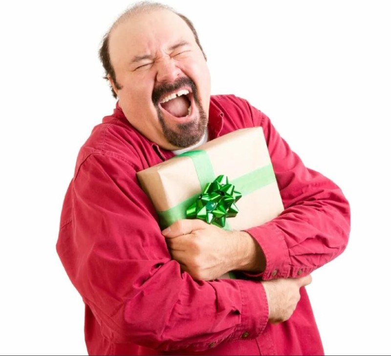 Create meme: the gift on February 23 , a man holds a gift, gift 