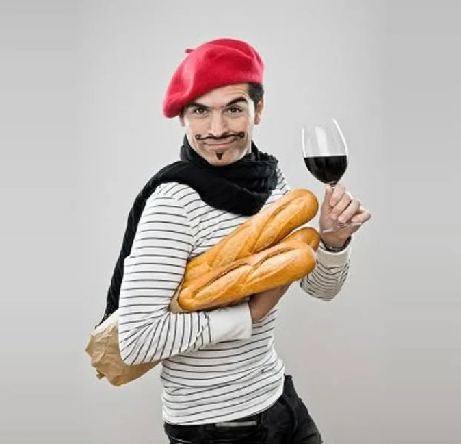 Create meme: stereotypical Frenchman, male , a Frenchman with a baguette