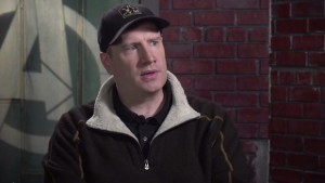 Создать мем: kevin feige, мужчина, кевин файги в шоке