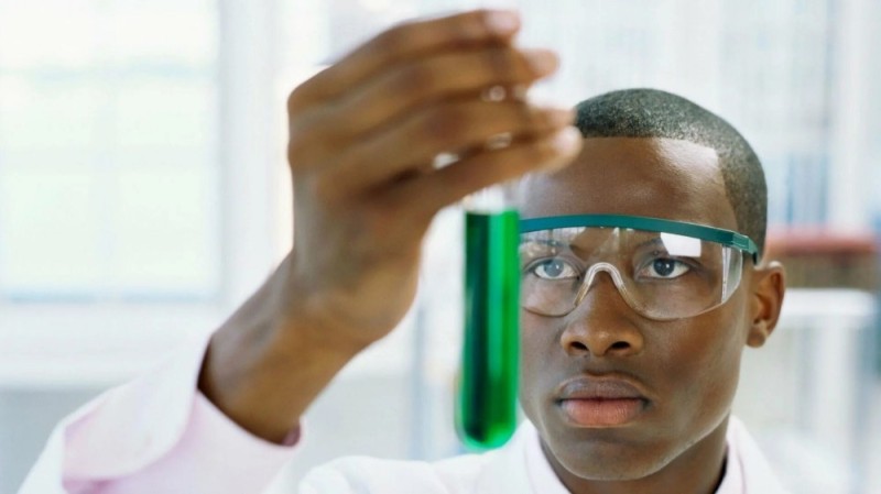 Create meme: a negro with a test tube, the negro scientist, meme creator