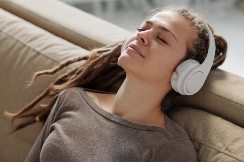 Create meme: A girl listens to music with headphones, listening to music on headphones, girl in headphones