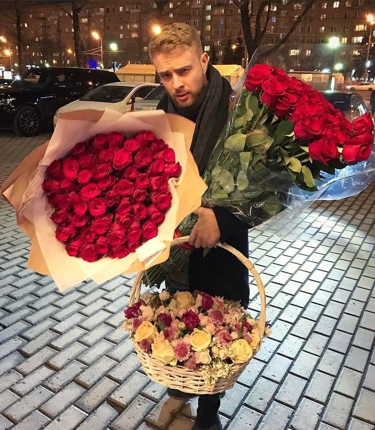 Create meme: egor creed happy birthday, egor creed with a bouquet, egor creed with flowers