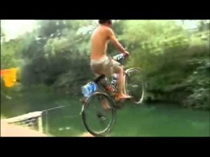 Создать мем: баженов катается на велосипеде по воде, велосипед из реки баженов, велосипед