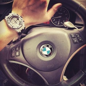Create meme: car BMW, photo the wheel of a BMW and hand